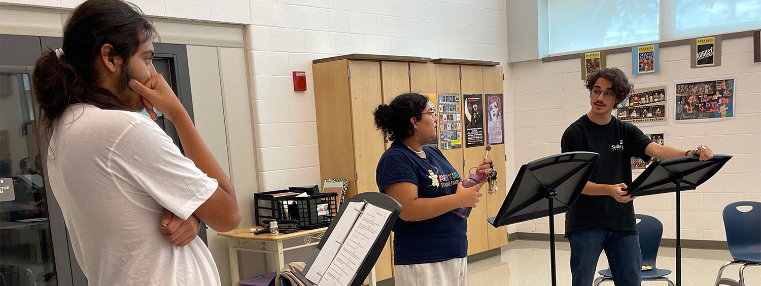 Students in school working with an Olney Theatre Center director