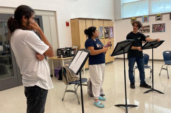 Students in school working with an Olney Theatre Center director
